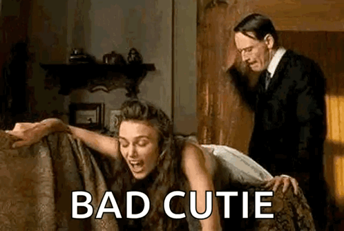 A Man Is Spanking A Woman On A Couch And The Woman Is Screaming . GIF