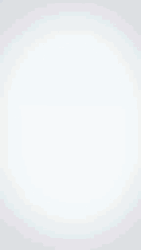 A Man Is Speaking Into A Microphone With The Name Alexander Under On His Shirt GIF