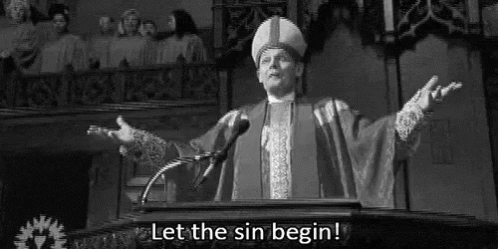 A Man Is Standing At A Podium Giving A Speech And Saying `` Let The Sin Begin ! '' GIF