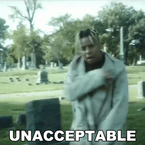 Man Standing In Cemetery Unacceptable Word GIF