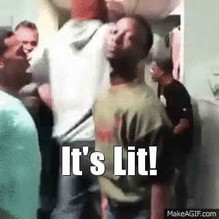 A Man Is Standing In A Crowd Of People With The Words `` It 'S Lit '' Written On The Bottom . GIF
