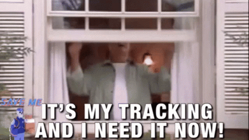 A Man Is Standing In A Doorway With The Words It 'S My Tracking And I Need It Now . GIF