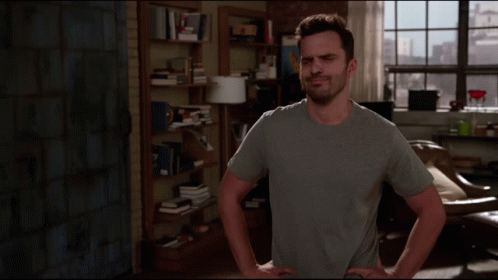 A Man Is Standing In A Living Room With The Words That Sounds Fishy On The Screen GIF