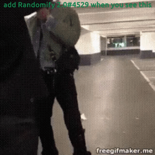 A Man Is Standing In A Parking Garage With The Words Add Randomify 2.0 # 4529 When You See This On The Bottom GIF