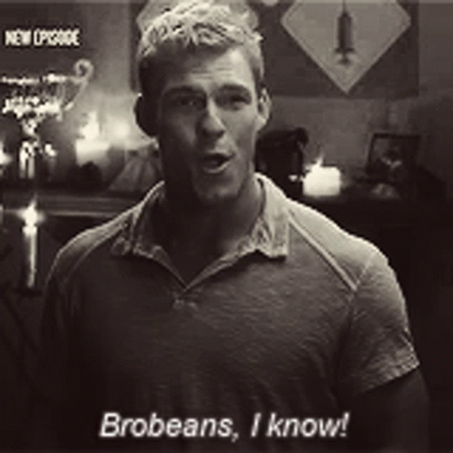 A Man Is Standing In A Room Talking To Someone And Says Brobeans , I Know . GIF
