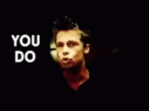 A Man Is Standing In Front Of A Black Background With The Words `` You Do Not '' Written In White Letters . GIF