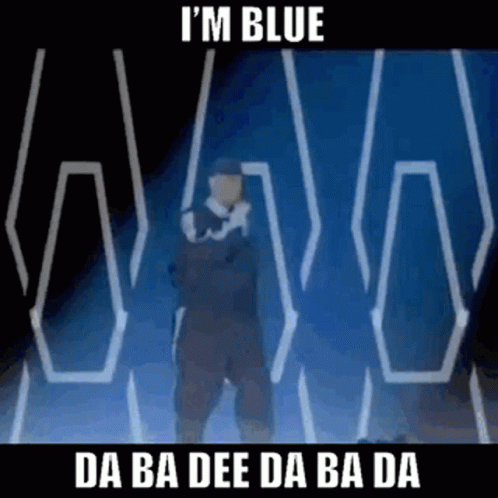 A Man Is Standing In Front Of A Blue Background With The Words `` I 'M Blue '' On It . GIF