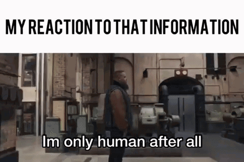 a man is standing in front of a building with the words `` my reaction to that information im only human after all '' wr