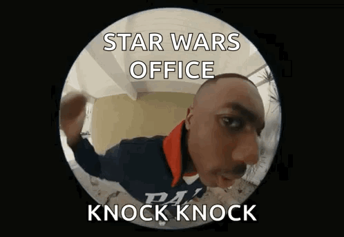 A Man Is Standing In Front Of A Door With The Words Star Wars Office Knock Knock Written On It GIF