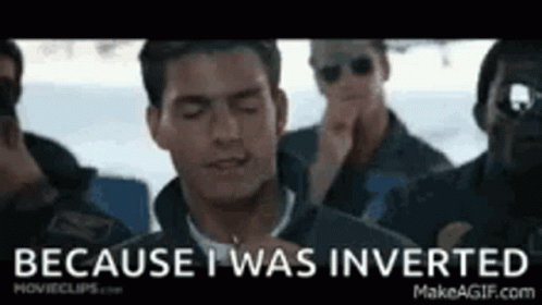 A Man Is Standing In Front Of A Group Of Men And Says `` Because I Was Inverted '' GIF