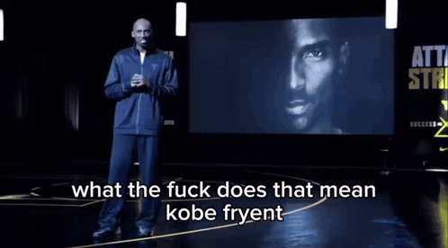 A Man Is Standing In Front Of A Large Screen That Says Atta Strike GIF