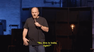 A Man Is Standing In Front Of A Microphone And Says " No This Is India Right " GIF