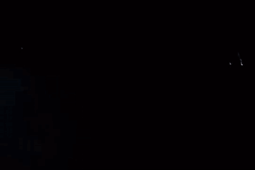 A Man Is Standing In Front Of A Motorcycle In The Fog GIF