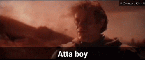 A Man Is Standing In Front Of A Mountain And The Word Atta Boy Is On The Bottom Right GIF