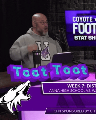 A Man Is Standing In Front Of A Sign That Says Coyote Foot Stat Show GIF