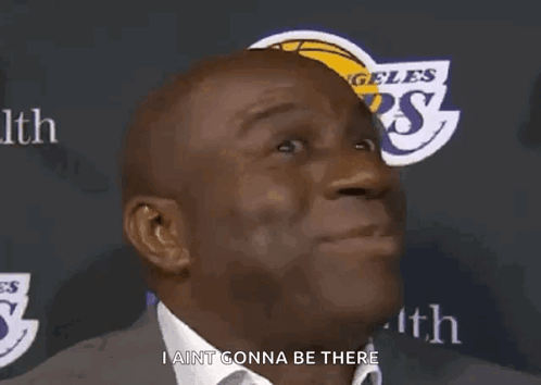 A Man Is Standing In Front Of A Sign That Says I Ain T Gonna Be There GIF