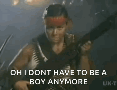 A Man Is Standing In Front Of A Sign That Says `` Oh I Don T Have To Be A Boy Anymore '' GIF