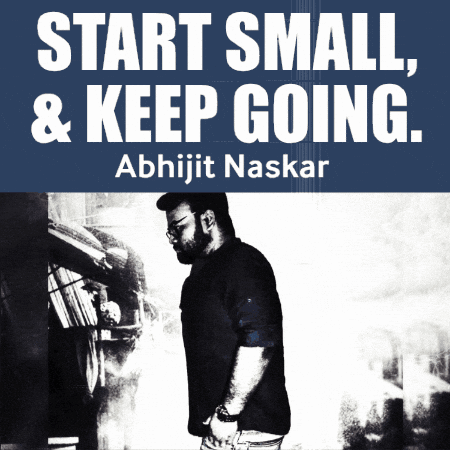 A Man Is Standing In Front Of A Sign That Says Start Small And Keep Going GIF