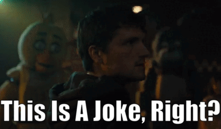 a man is standing in front of a sign that says " this is a joke right "