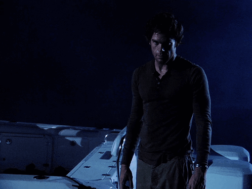 A Man Is Standing In Front Of A Sign That Says Would You In My Position GIF