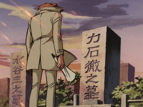 Man Standing In Front Of Chinese Inscribed Stone GIF