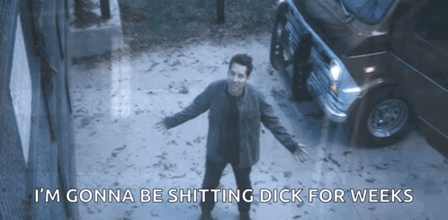 A Man Is Standing In Front Of A Van With The Words I 'M Gonna Be Shitting Dick For Weeks Above Him GIF