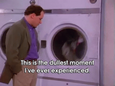 A Man Is Standing In Front Of A Washing Machine And Says This Is The Dullest Moment I 'Ve Ever Experienced GIF
