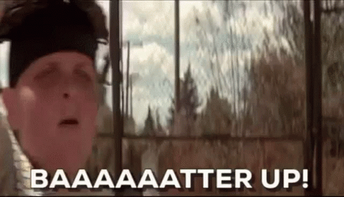 A Man Is Standing In Front Of A Window With His Eyes Closed And The Words `` Baaaaa Atter Up '' . GIF