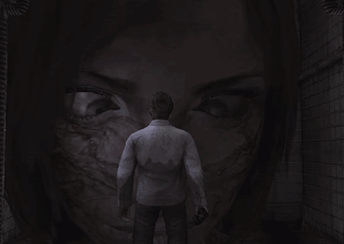 A Man Is Standing In Front Of A Woman 'S Face GIF