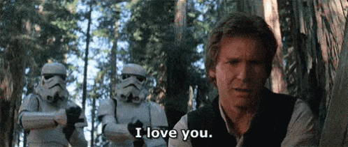 A Man Is Standing In The Woods With Stormtroopers Behind Him And Says I Love You . GIF