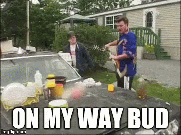 A Man Is Standing Next To A Car With The Words On My Way Bud Written On The Bottom GIF