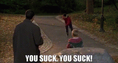 A Man Is Standing Next To A Child On A Sidewalk And Says `` You Suck You Suck '' . GIF
