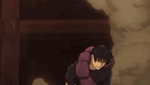 A Man Is Standing Next To A Purple Worm . GIF