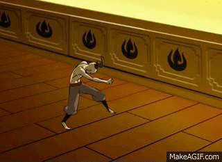 A Man Is Standing On A Wooden Floor In A Room . GIF