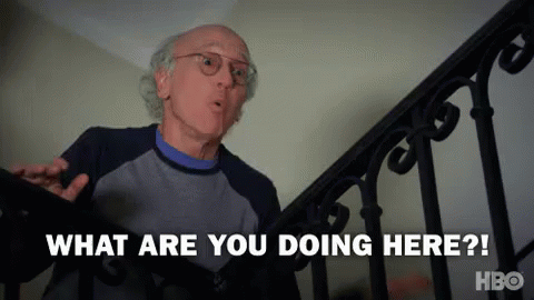 A Man Is Standing On Top Of A Set Of Stairs And Asking What Are You Doing Here ? GIF