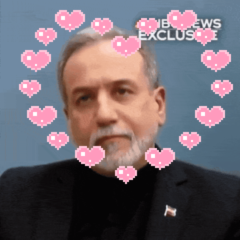 A Man Is Surrounded By Pink Hearts And The Words Nbc News Exclusive Are Behind Him GIF