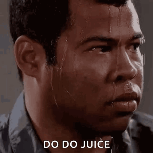 A Man Is Sweating And Looking At The Camera With The Words `` Do Do Juice '' Written Above Him . GIF