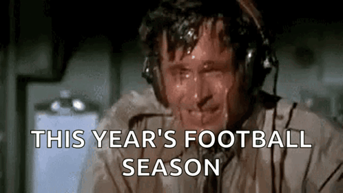 A Man Is Sweating While Wearing Headphones And The Words `` This Year 'S Football Season '' Are Written Above Him . GIF