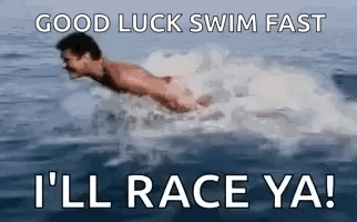 Swimmer In Ocean With Good Luck Race Text GIF