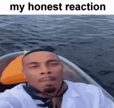 A Man Is Taking A Selfie In A Boat And The Caption Says My Honest Reaction GIF