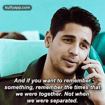 A Man Is Talking On A Cell Phone And Has A Quote On It . GIF