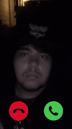 A Man Is Talking On A Cell Phone And The Name John Pork Is Calling GIF