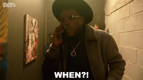 A Man Is Talking On A Cell Phone And The Word When Is On The Screen GIF