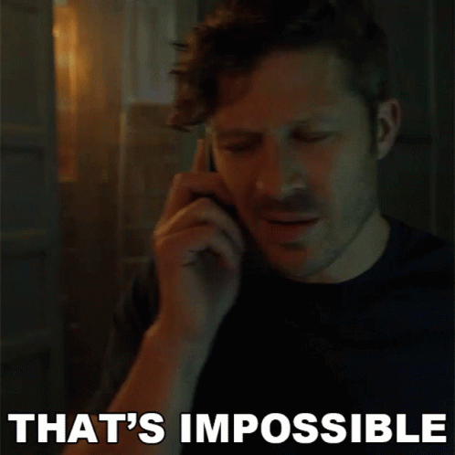 A Man Is Talking On A Cell Phone And The Words That 'S Impossible Are Above Him GIF
