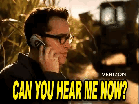 a man is talking on a cell phone in a field and says `` can you hear me now ? ''