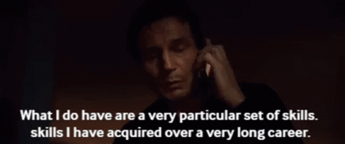 A Man Is Talking On A Cell Phone With The Words " What I Do Have Are A Very Particular Set Of Skills " Written Below Him GIF