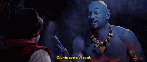A Man Is Talking To A Blue Genie Who Says " Giants Are Not Real " GIF