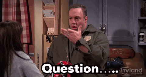 A Man Is Talking To A Girl In A Kitchen And The Word Question Is On His Chest GIF