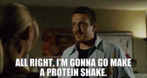 A Man Is Talking To A Woman And Says " All Right I 'M Gonna Go Make A Protein Shake " GIF
