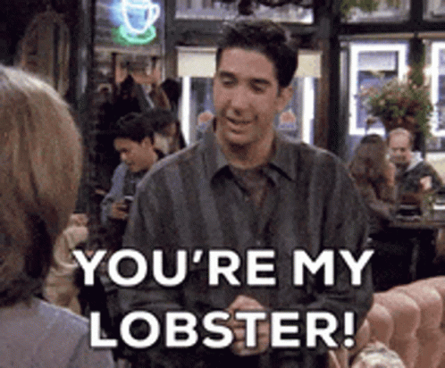 A Man Is Talking To A Woman And Says `` You 'Re My Lobster '' . GIF
